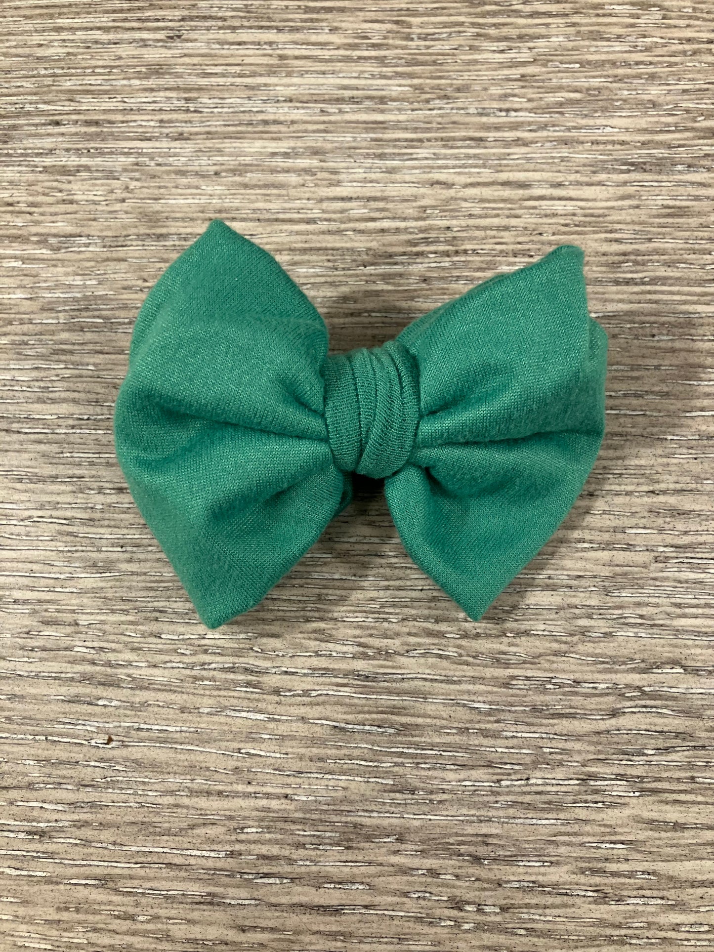 Kelly green clip bow
