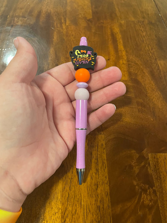 Amuck orange and purple pen