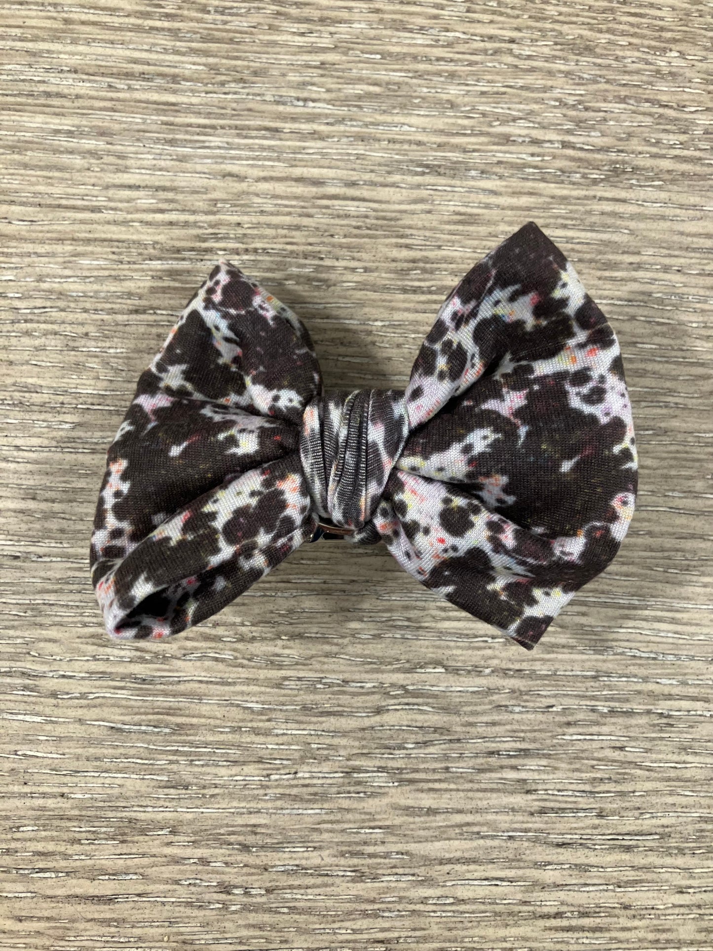 Cow paint splatter clip bow