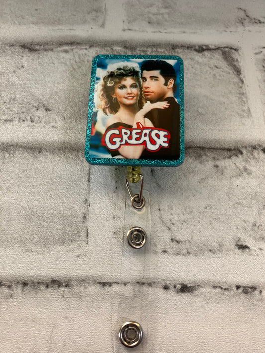 Grease badge reel