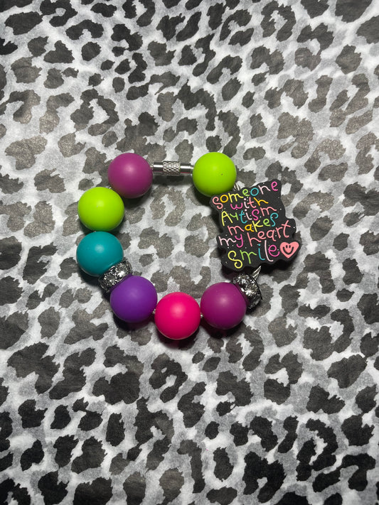Someone with autism makes me smile tumbler charm