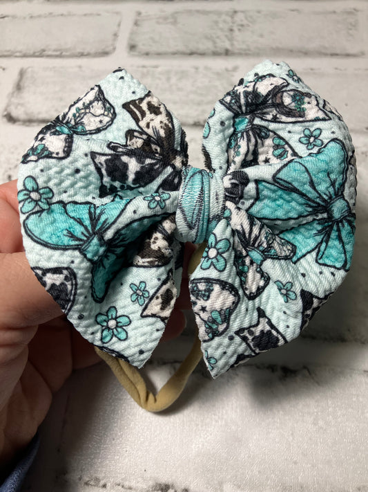 Teal cow bows nylon bow