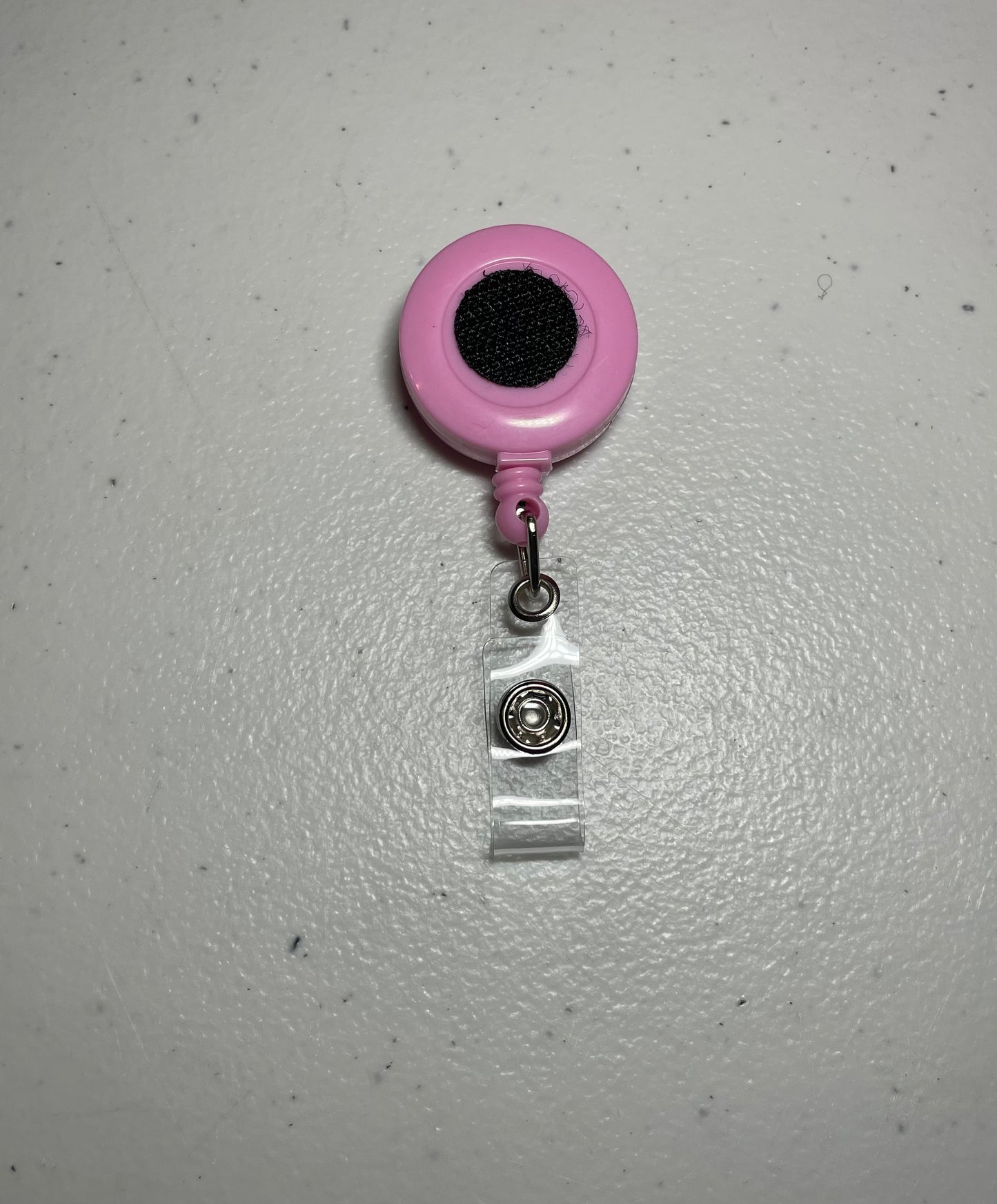 Light pink badge reel base