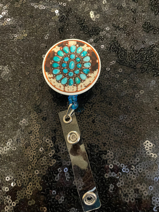 Turquoise cow badge reel