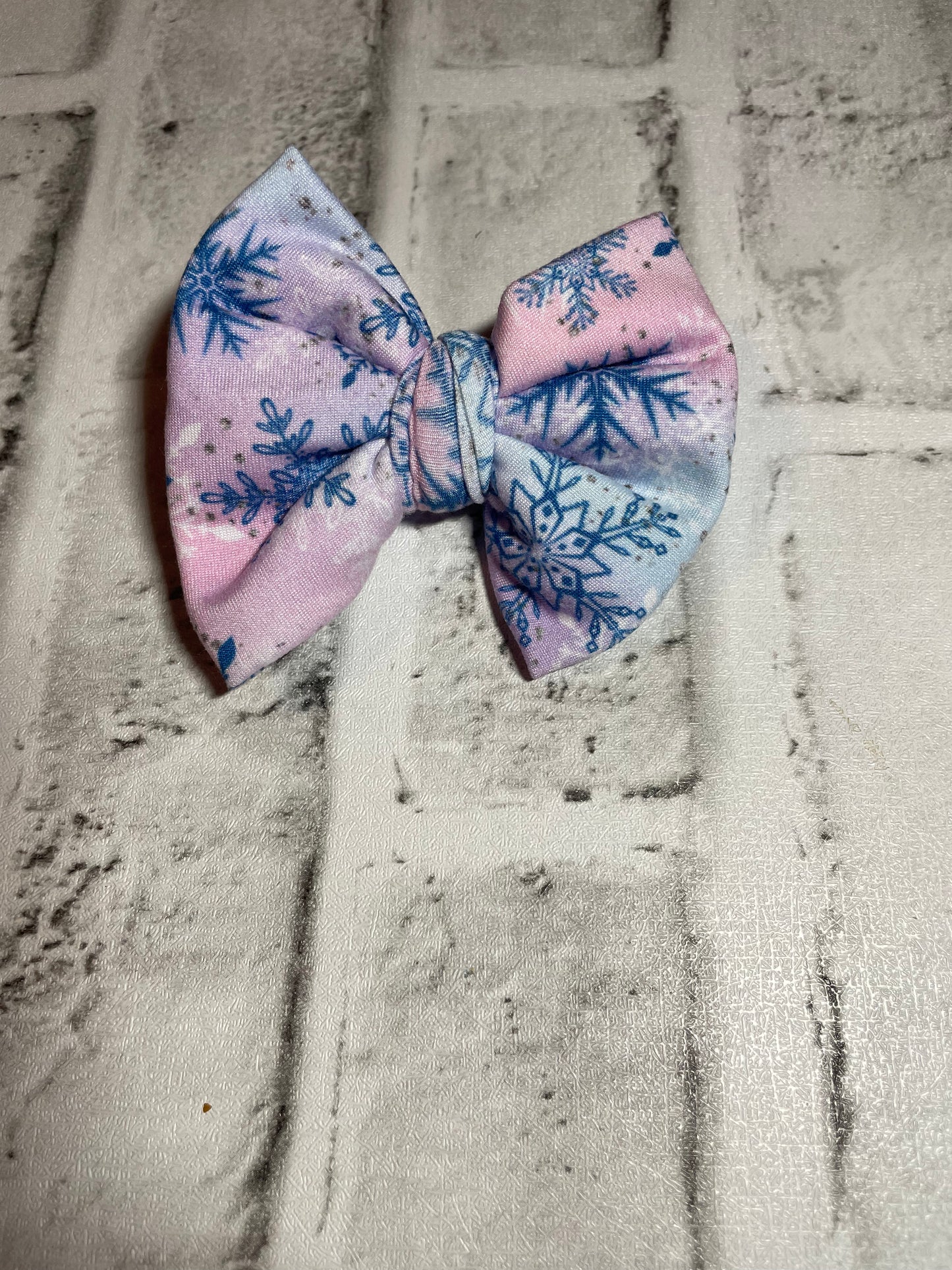 Pink blue snowflake clip bow