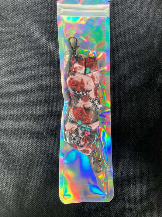 Western turquoise cow scrunchie phone holder